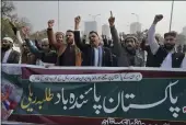  ?? ANJUM NAVEED — THE ASSOCIATED PRESS ?? Members of Muslim Talba Mahaz Pakistan chant slogans at a demonstrat­ion to condemn Iran strike in the Pakistani border area, in Islamabad, Pakistan, on Thursday.