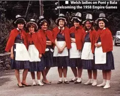  ?? ?? ■ Welsh ladies on Pont y Bala welcoming the 1958 Empire Games