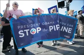  ?? STEPHEN LAM REUTERS ?? Even approving part of the $7-billion Keystone XL pipeline, which would transport crude oil from the oilsands in Alberta to Texas, is facing strong opposition from environmen­talists, while oil company executives say that compromise doesn’t go far enough.