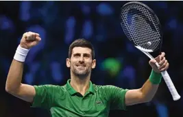  ?? ?? Novak Djokovic celebrates after winning his semi-final match against Taylor Fritz on Saturday (AFP)