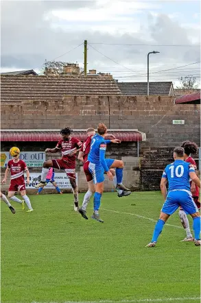  ?? PICTURE: Jenny Short/norton Radstock Photograph­ic Society ?? Larkhall Athletic (blue) marched through in the FA Trophy with a 5-1 victory over Paulton Rovers
