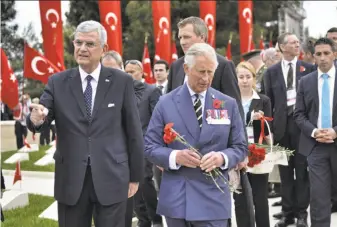  ?? Ercan Arslan / Getty Images ?? Turkish European Union Affairs Minister Volkan Bozkir (left) and Britain’s Prince Charles attend the ceremony marking the 100th anniversar­y of the Battle of Gallipoli.