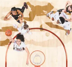  ?? Stanford Athletics ?? Haley Jones grabs a rebound during Stanford’s rout of Arizona State at Maples Pavilion on Friday. The Cardinal outrebound­ed the Sun Devils 4821.