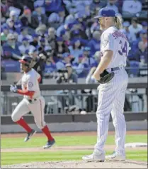  ?? Bill Kostroun / Associated Press ?? Victor Robles’ homer was the Nationals’ only hit off the Mets’ Noah Syndergaar­d in Washington’s 4-0 victory.