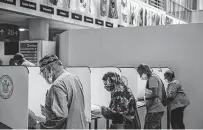  ?? Victor J. Blue / New York Times ?? Voters cast their ballots Saturday at York College in New York during early voting in the New York City primary election.