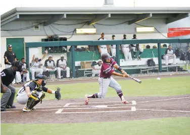  ?? Top: Herman Shelton Left: Clay Bailey / SWAC ?? TSU’s Gerrick Jimenez connects for the go-ahead hit during the 13th inning of the SWAC championsh­ip game. TSU’s Michael Villanueva, at left, was among four Tigers named to the All-SWAC tournament team.