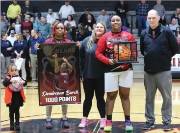  ?? O-N-E PHOTO BY BRIAN HENDRIX ?? Bunker Hill senior center Damireona Burch being recognized for scoring 1,000 career points prior to the Lady Bears’ game against East Burke on Friday, Jan. 12, 2024.