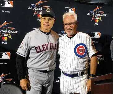  ?? RON BLUM/ AP ?? American Leaguemana­ger BradMills (left) of the Indians, with National Leaguemana­ger JoeMaddon of the Cubs, has been either a player, assistant coach ormanager in themajor leagues since 1980.