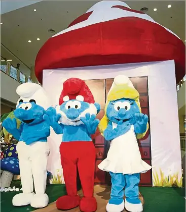  ??  ?? In this 2011 file picture at Queensbay Mall, Penang, the Smurfs were used to draw in the crowds. Will they be as successful in Brussels?