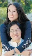  ??  ?? Elaine Lui holds her mother, Judy Yeung.