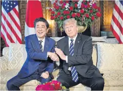  ?? AFP ?? US President Donald Trump greets Japanese Prime Minister Shinzo Abe at Mr Trump’s Mar-a-Lago resort in Palm Beach, Florida in April.