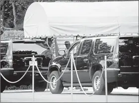  ?? AP/J. SCOTT APPLEWHITE ?? President Donald Trump boards his motorcade Saturday at the White House en route to his golf course in Sterling, Va., shortly after tweeting a threat to end the North American Free Trade Agreement over difference­s with Canada.