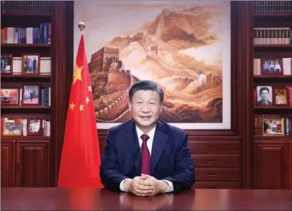  ?? XINHUA ?? President Xi Jinping delivers a New Year address to ring in 2023 in the evening of Dec 31, 2022.