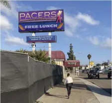  ?? AP file ?? WAIT, WHO STAYS AT HOME? The Pacers Showgirls Internatio­nal strip club is seen in San Diego. Officials say the club defied a stay-at-home order to provide live entertainm­ent over the weekend.