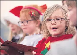  ??  ?? Pupils at Lumsden School, in Aberdeensh­ire, sing Christmas carols
