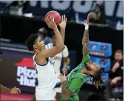  ?? DARRON CUMMINGS — THE ASSOCIATED PRESS ?? Villanova’s Jermaine Samuels (23) shoots over North Texas’ James Reese (0) during the first half of a secondroun­d game in the NCAA men’s college basketball tournament at Bankers Life Fieldhouse, Sunday.