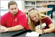 ?? COURTESY PHOTO ?? Farmington senior Samantha Troilo (right), accompanie­d by her brother, Seth, signs a national letter of intent to play college tennis Oct. 12.
