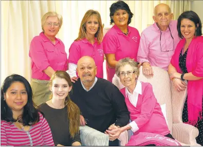  ??  ?? Roberta Kieliger, far right in front, visits at her home in La Plata with the first two recipients of the Roberta Kieliger Sisters at Heart Scholarshi­p, from left in front, Pilar Gonzales and Emily DiToto, with her husband, Bob Kieliger by her side,...