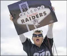  ?? JOHN LOCHER / AP ?? Labor union member Geraldine Lacy celebrates Monday in Las Vegas after NFL owners approved the move of the Raiders from Oakland by a 31-1 vote.