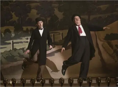  ?? SONY PICTURES CLASSICS ?? “Stan &amp; Ollie,” starring Steve Coogan, left, as Stan Laurel and John C. Reilly as Oliver Hardy, looks at the tail end of the legendary comedy duo’s career.