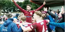  ??  ?? CHAMPAGNE MOMENT: Taunton celebrate their title win
