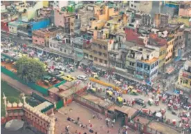  ??  ?? An aerial view of Urdu Bazar from the minaret of Jama Masjid