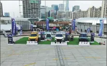  ?? PHOTOS PROVIDED TO CHINA DAILY ?? Clockwise from top: Sinotruk displays its heavy trucks, powertrain systems and light commercial vehicles at an exhibition area during its annual conference.