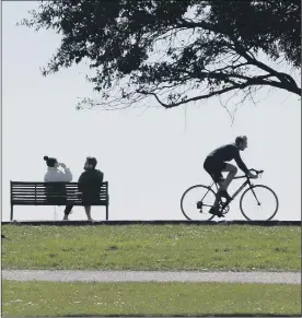  ??  ?? BLISS
Cycling along the seafront, a view from Canoe Lake