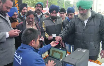  ?? Narinder Nanu / AFP ?? Aadhaar programme is designed to make it easier for Indians to prove their identity and register for services.