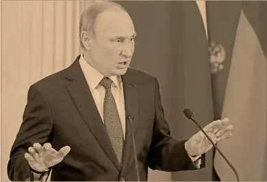  ?? Foto: ap ?? En conferenci­a de prensa conjunta con el presidente de Moldavia, Vladimir Putin defendió su postura.