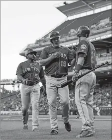  ?? JOHN MINCHILLO/AP PHOTO ?? Jay Bruce of the Mets (19) celebrates with Todd Frazier (21) after hitting a two-run home run in the third inning of Monday’s game.