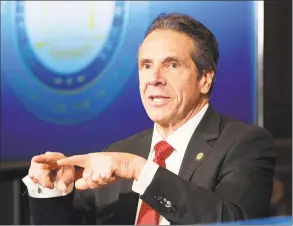  ?? Michael Brochstein / TNS ?? New York Gov. Andrew Cuomo speaks at a news conference at the State Capitol in Albany, N. Y., on April 30.