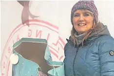  ?? ?? C’mon the Reds Observer reporter Kaiya Marjoriban­ks manned the drop-off point at Stirling Albion’s Forthbank stadium during the Binos Christmas Bonanza