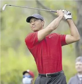  ?? (Photo: AP) ?? Tiger Woods watches his tee shot on the fourth hole during the final round of the PNC Championsh­ip golf tournament in Orlando, Florida, on December 20, 2020. Tiger, a two-part documentar­y about Woods, premieres today, January 10 on HBO.