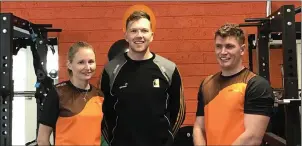  ??  ?? Owners Keeley and Robbie Farrell with special guest Walter Walsh, Kilkenny hurler, at the official opening of at Farrell Fitness on The Quay, New Ross.