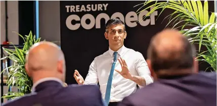  ?? ?? Making a point...the Chancellor hears from local business owners and answers questions in Stoke yesterday