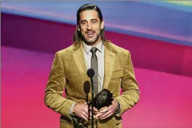  ?? MARK J. TERRIL / AP ?? Aaron Rodgers receives the AP Most Valuable Player of the Year Award at the NFL Honors show on Feb. 10 in Inglewood, Calif. Rodgers sent out an Instagram post late Monday night thanking current and former teammates and coaches.