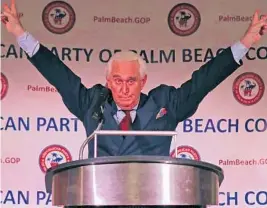  ?? JOHN MCCALL/SOUTH FLORIDA SUN SENTINEL ?? Political operative Roger Stone throws his hands up in a Richard Nixon-style v (for victory) salute after finishing a speech at a Palm Beach County Republican Party dinner in 2019.