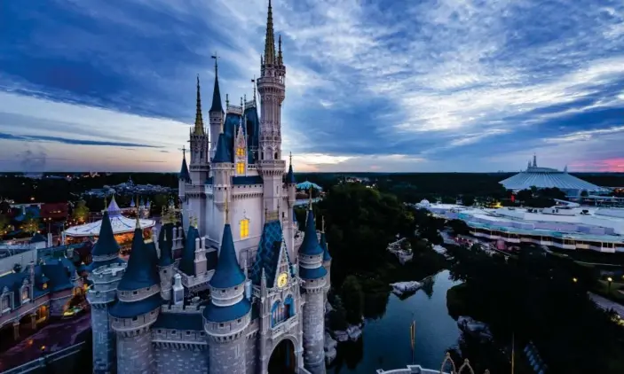  ?? Photograph: Walt Disney World Resort/Getty Images ?? Walt Disney World resort theme parks began a phased reopening on 11 July in Lake Buena Vista, Florida.