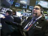  ?? RICHARD DREW — THE ASSOCIATED PRESS ?? Trader Michael Capolino works Thursday on the floor of the New York Stock Exchange.