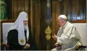  ?? ADALBERTO ROQUE — POOL PHOTO ?? The head of the Russian Orthodox Church, Patriarch Kirill, left, and Pope Francis talk during their meeting at the Jose Marti airport in Havana, Cuba.
