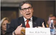  ?? Carolyn Kaster / Associated Press ?? Ex-Texas Gov. Rick Perry vowed to rely on federal scientists who work on climate change.