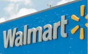  ?? ALAN DIAZ/AP FILE ?? Walmart is adding four new fulfillmen­t centers to its existing capacity, a move that will bring more than 4,000 jobs and make next- or two-day shipping available to more Americans.