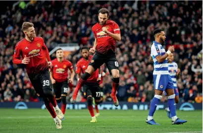  ?? Reuters ?? Manchester United’s Juan Mata celebrates a goal against Reading during the FA Cup third round match. —