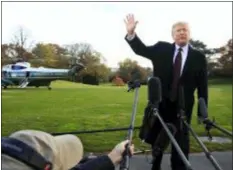  ?? MANUEL BALCE CENETA — THE ASSOCIATED PRESS ?? President Donald Trump speaks to the media before leaving the White House in Washington, Tuesday to travel to Florida, where he will spend Thanksgivi­ng at Mar-a-Lago.