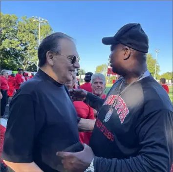  ?? Mike White/Post-Gazette ?? Legendary former Aliquippa coach Don Yannessa, 83, Victor Lay, right, at the opening of
Aliquippa’s Heinz Field last Friday.