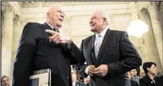  ?? DREW ANGERER / GETTY IMAGES ?? Sen. Patrick Leahy, D-Vt., (left) talks with Sonny Perdue, President Trump’s nominee to lead the Agricultur­e Department, before the start of Perdue’s confirmati­on hearing.