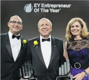  ??  ?? Lui Petrollini, EY partner and program director in Vancouver withJohn Anderson, chairman and CEO of The Oppenheime­r Group, Pacific Entreprene­ur of the Year and winner for the food &amp; beverage category, and Colleen McMorrow, EY partner and program directorfo­r Ontario and Canada.