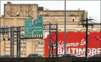  ?? JULIA NIKHINSON/ASSOCIATED PRESS ?? Traffic continues on Interstate 95 in Baltimore after the collapse of the Francis Scott Key Bridge last week. Navigation in and out of the Port of Baltimore could resume soon.