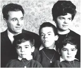  ??  ?? Family: Mr Ulleri, centre, with his parents and brothers
